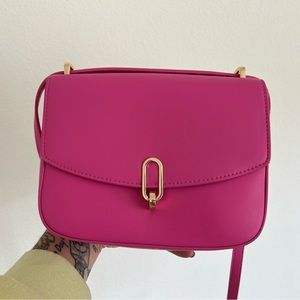 A purse I bought and never wore. Little dents from being in storage.